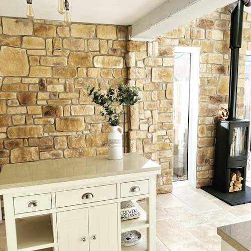 Cotswold Blend stone cladding on an internal wall in a warm modern interior