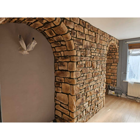 Stone cladding featuring a sandstone blend, showcasing natural aesthetics in a beautifully designed interior space.