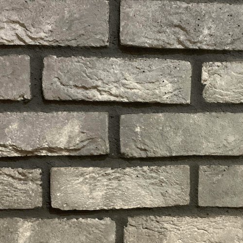 White washed grey brick slips