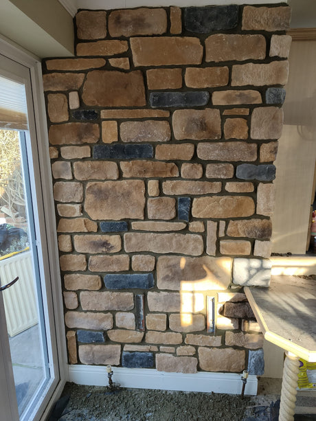 Antique Blend Stone Cladding featuring a mix of textures and colors, enhancing interior walls with natural aesthetics.