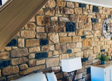 Antique Blend Stone Cladding showcased on a wall, enhancing the interior design with natural aesthetics.
