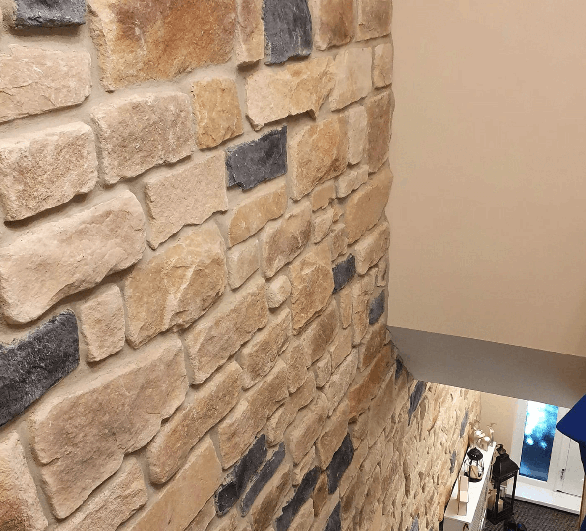 Antique Blend Stone Cladding showcased on a stairway wall, featuring natural stone aesthetics and elegant design.